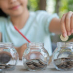 First lessons in saving, how to teach a 3-year-old to save money, best piggy banks for toddlers financial education, age-appropriate saving activities for preschoolers, introducing money concepts to young children,