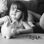 First lessons in saving, how to teach a 3-year-old to save money, best piggy banks for toddlers financial education, age-appropriate saving activities for preschoolers, introducing money concepts to young children,