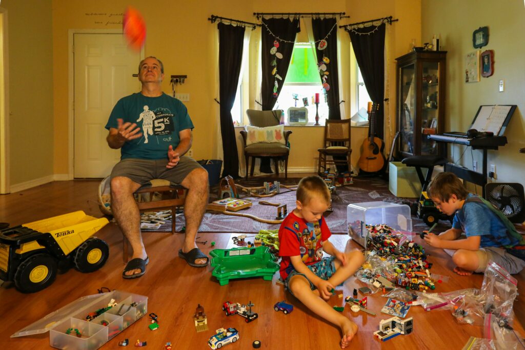 pretend play shop at home,
teaching money skills through imaginative play activities,
financial literacy games for preschoolers at home,
how to set up pretend store for kids learning,
earning and spending concepts through play for young children,